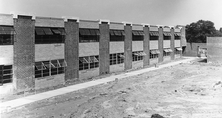 Black and white photograph of Langley High School. Construction of the building is nearing completion.